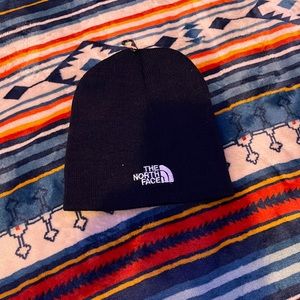 The North Face Beenie never been wore still has the hook on it? NEW